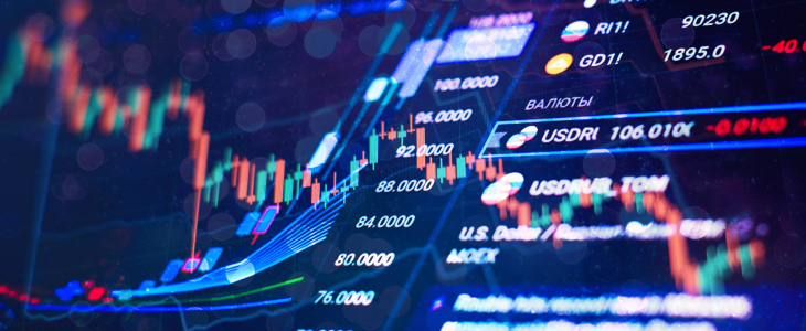 Detailed close-up of a digital screen featuring stock market data, including charts and numerical values.