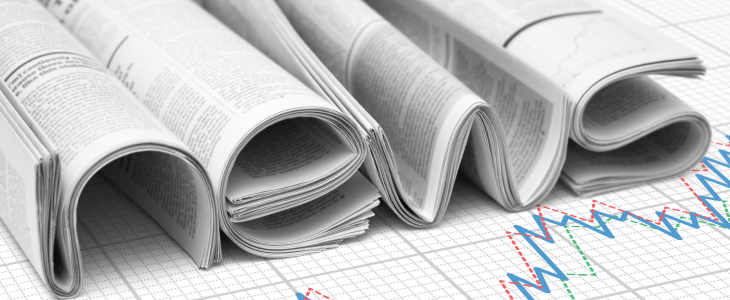 Newspapers spread over a stock chart, symbolizing the intersection of journalism and financial analysis.