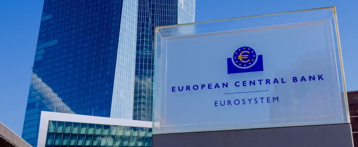 European Central Bank headquarters, featuring a graphic representation of interest rate cuts aimed at economic recovery.