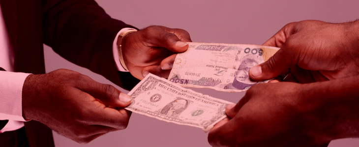 Two men in suits are confidently holding stacks of money, showcasing a successful forex financial transaction.